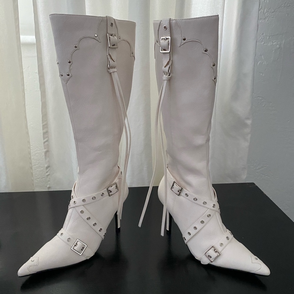 Bran New never used knee high boots. Pointy.